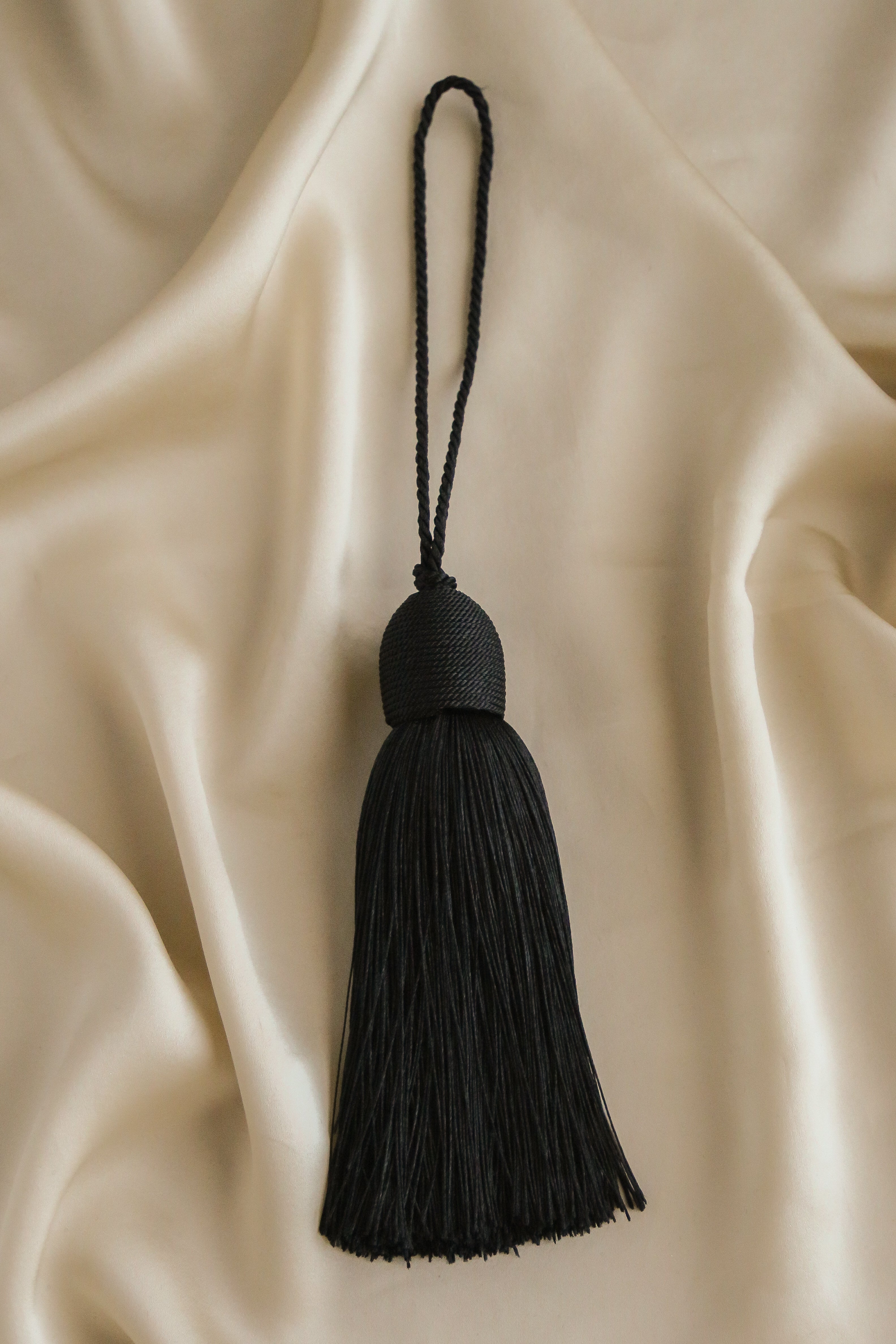 Bon Bon Tassel Bag Charm - Boutique Minimaliste has waterproof, durable, elegant and vintage inspired jewelry