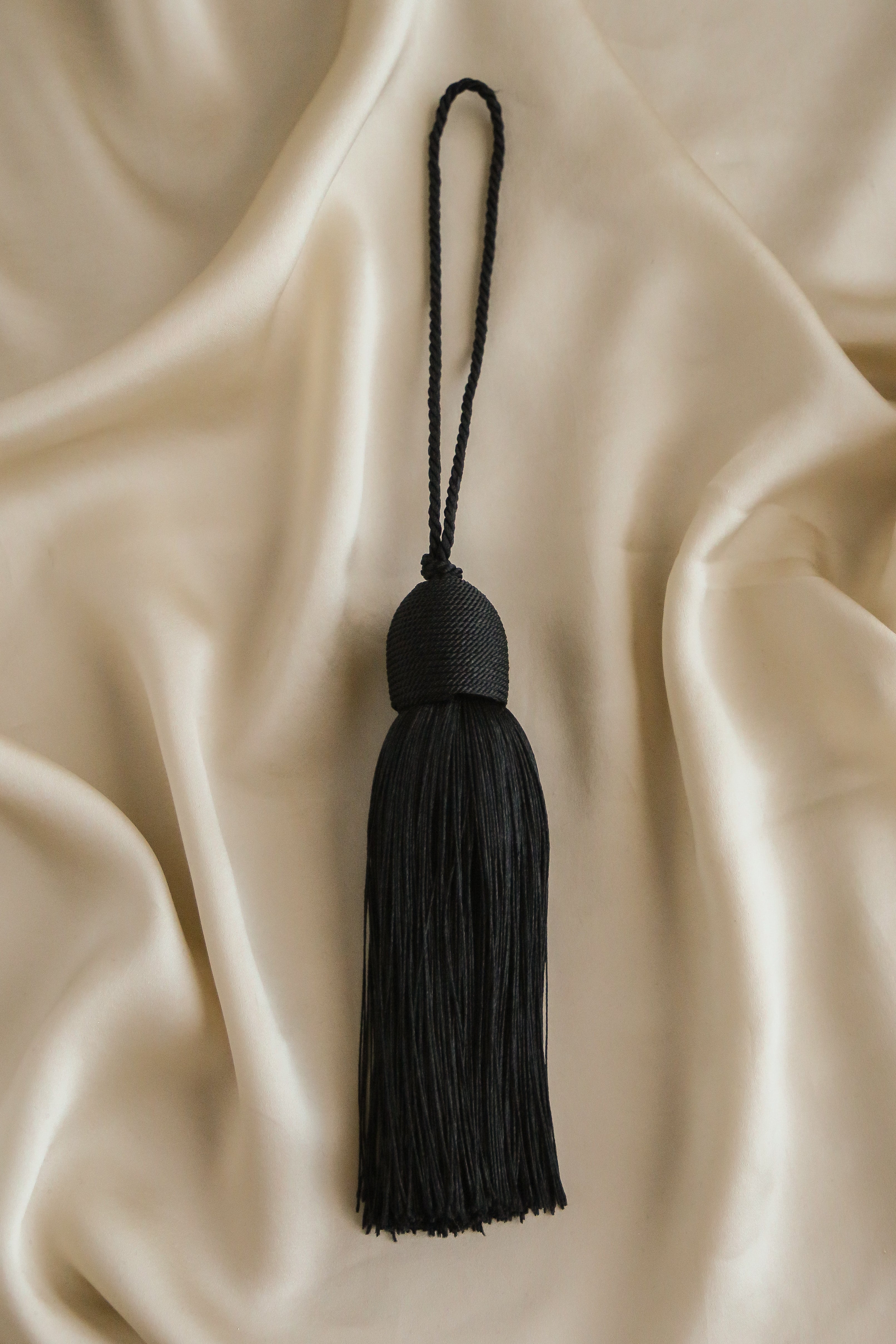 Bon Bon Tassel Bag Charm - Boutique Minimaliste has waterproof, durable, elegant and vintage inspired jewelry