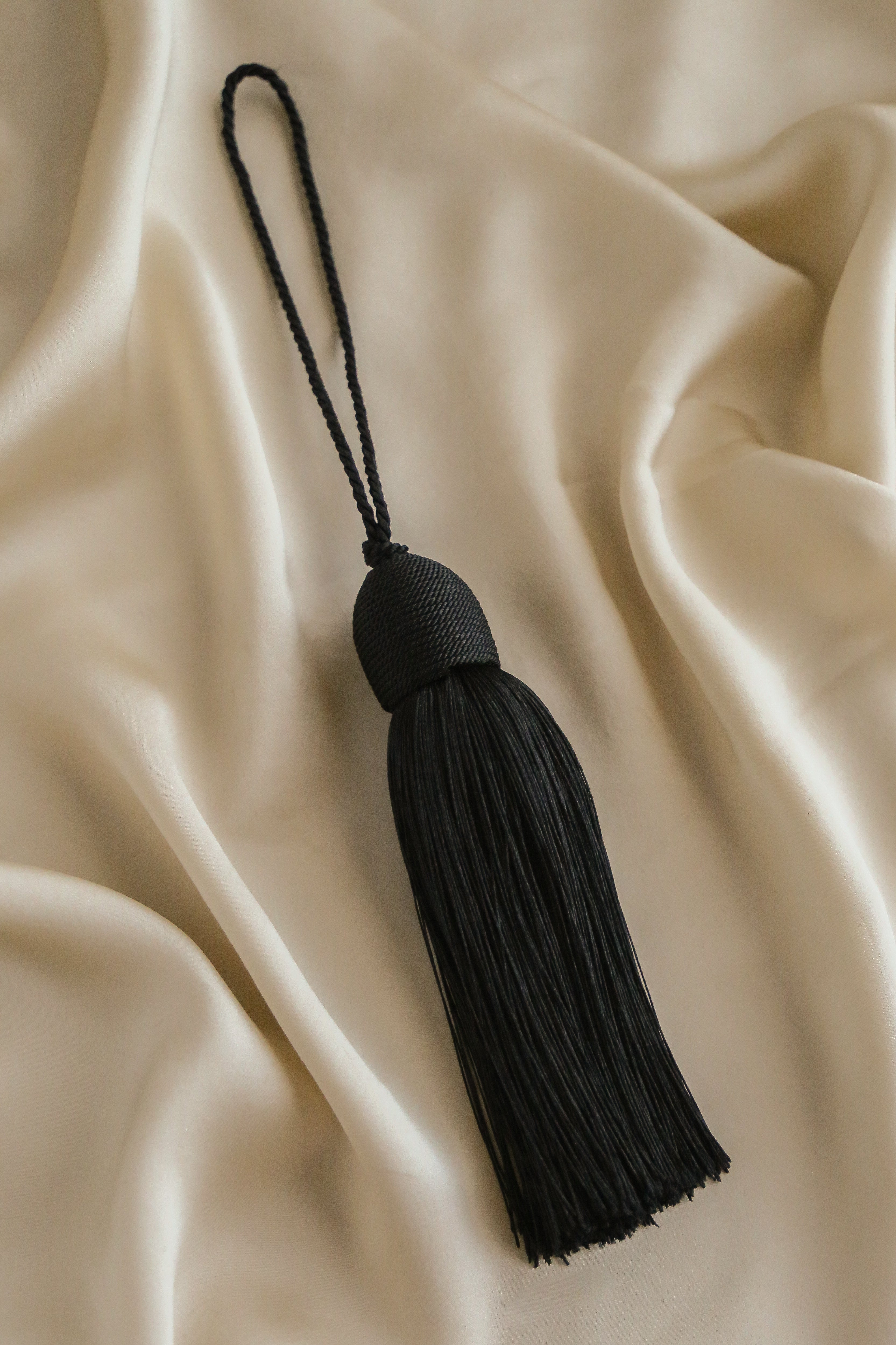 Bon Bon Tassel Bag Charm - has waterproof, durable, elegant and vintage inspired jewelry